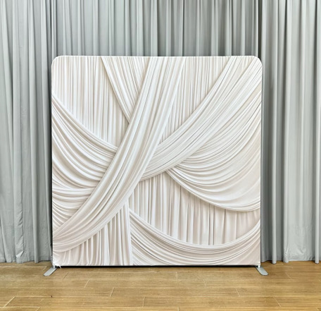 Ivory woven drape photo booth backdrop with soft folds